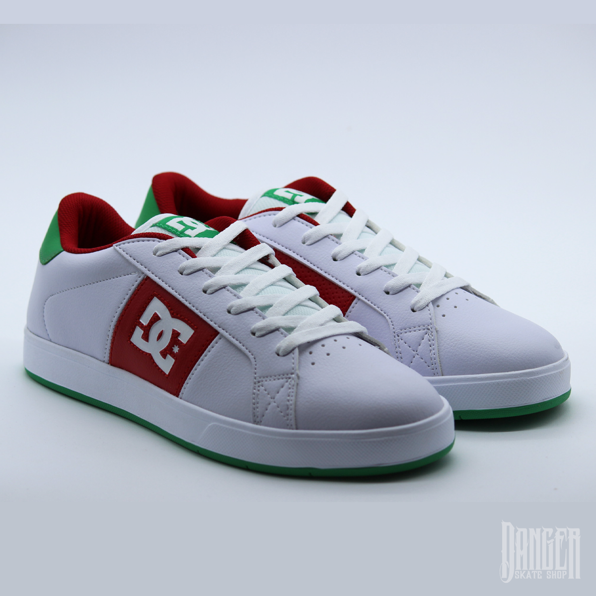 Green and white dc top shoes